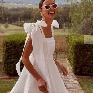 DISSH Aisle White 100% Linen Bow-Tie Mini Dress